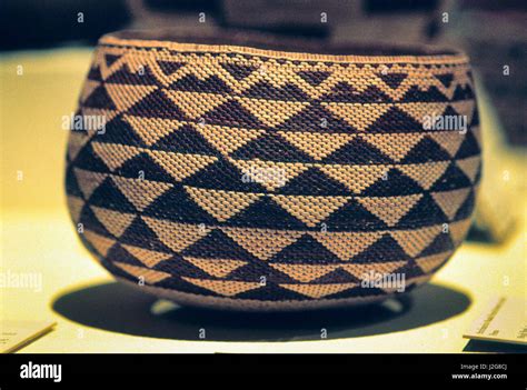 Traditional Pomo Indian basket woven with geometric designs Stock Photo ...