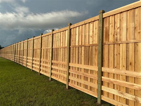 Custom Fences Custom Fencing Company Orlando | Mossy Oak Fence | Fence design, Wood fence design ...