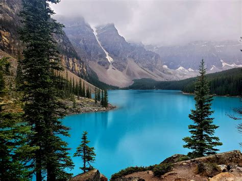 Moraine lake at Banff National Park in Alberta, Canada on a cloudy day ...