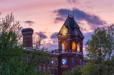 The University of New Hampshire, UNH Manchester campus at sunset ...