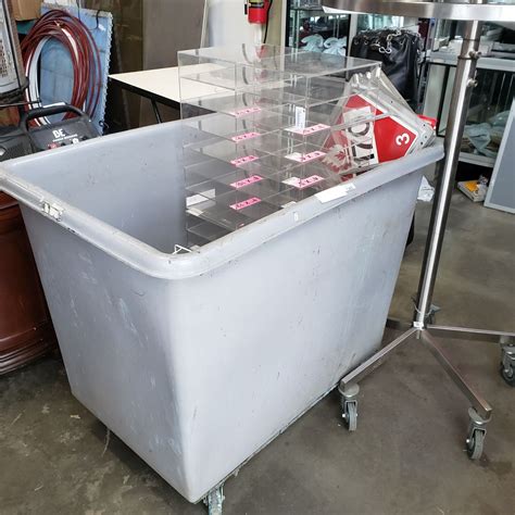 LARGE PLASTIC WAREHOUSE CART W/ CONTENTS - Big Valley Auction