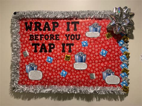 a bulletin board that says wrap it before you tap it on the wall with ...