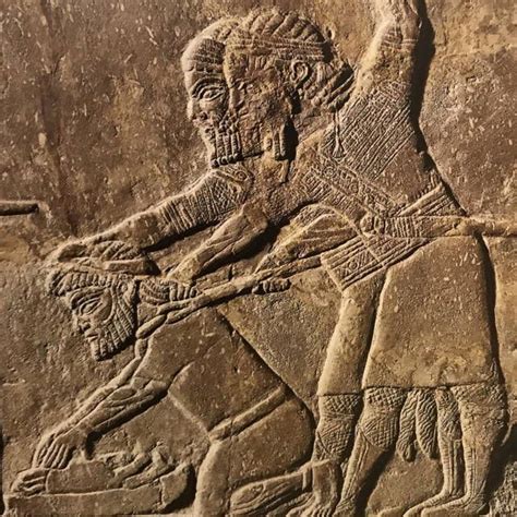 Artefacts — Two Assyrian soldiers forcing Babylonian captive...