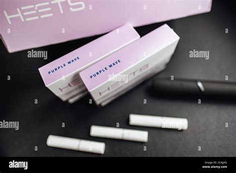 Heating tobacco sticks New box Heets Purple Wave with iqos 3.0 Stock Photo - Alamy