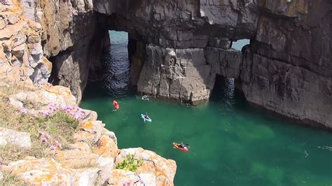 Kayaks at Stackpole Head - YouTube