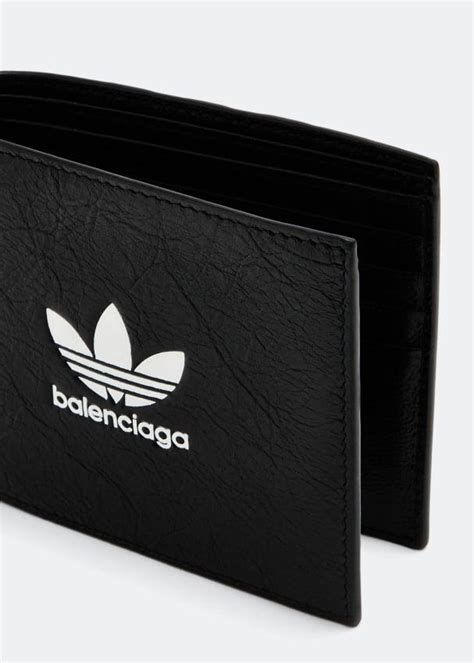 Balenciaga x adidas Square folded wallet for Men - Black in UAE | Level ...