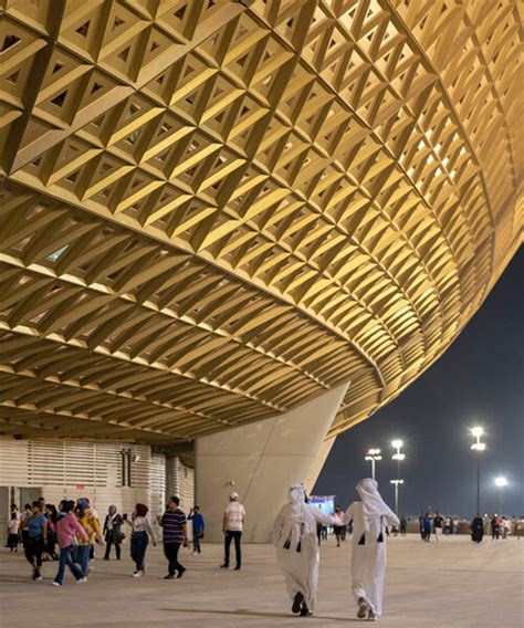 foster + partners' lusail stadium stands as a 'golden vessel' in qatar