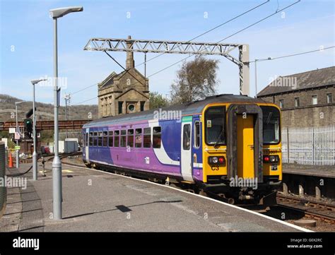 (Northern) class 153 diesel unit leaving Carnforth. Train in Northern livery but with branding ...