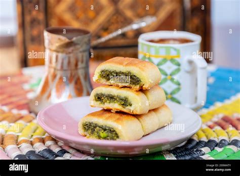 Arabic sweets, maamoul and coffee on traditional background Stock Photo - Alamy