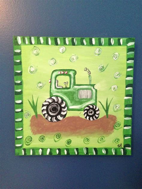 a painting on the wall of a child's room with a tractor painted on it