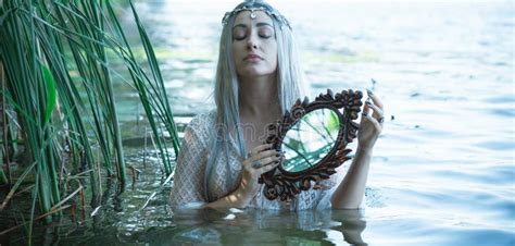 Pagan Rituals in Lake, Young Woman in White Stock Photo - Image of meditation, european: 188360352