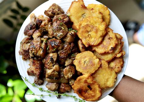 Baked Haitian Pork Griot and Crisp Tostones - Travelandmunchies