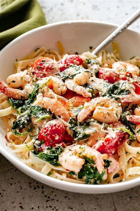 Creamy Shrimp Fettuccine with Spinach and Tomatoes Recipe - For a quick and delicious weeknight ...