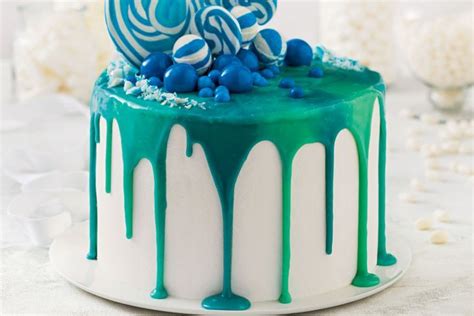 Blue layered sponge with ganache drizzle