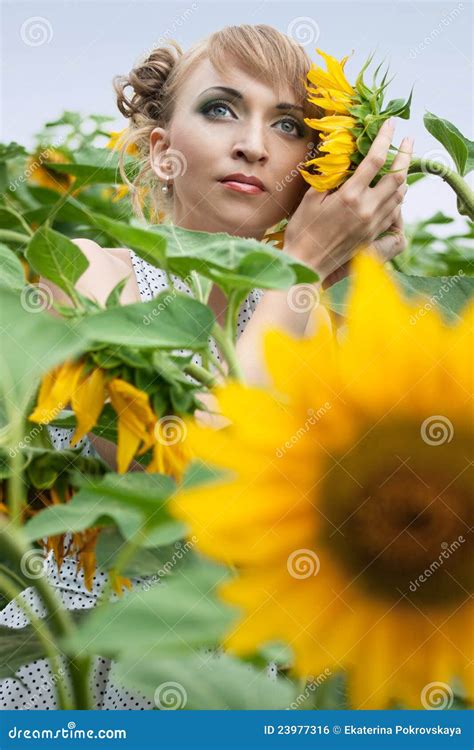 Girl with a sunflowers stock photo. Image of fresh, hold - 23977316