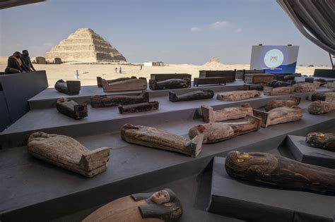 Egypt unveils ancient coffins, statues found in Saqqara | AP News