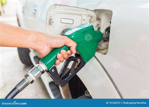 Man Fill Up Fuel at a Gas Station. Stock Image - Image of ecology ...