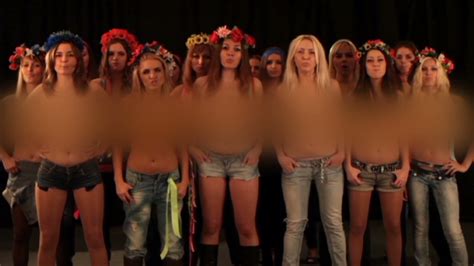 Topless feminist protesters show what they're made of - CNN.com