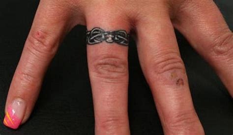 Gorgeous Wedding Ring Themed Tattoo Design on Finger