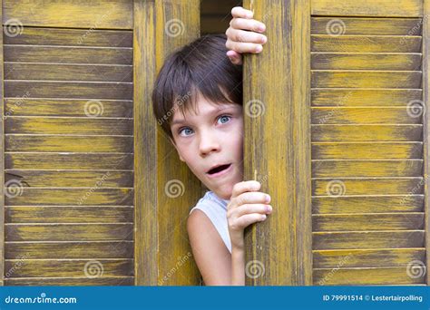 Boy looks wooden door stock photo. Image of meal, pizzeria - 79991514