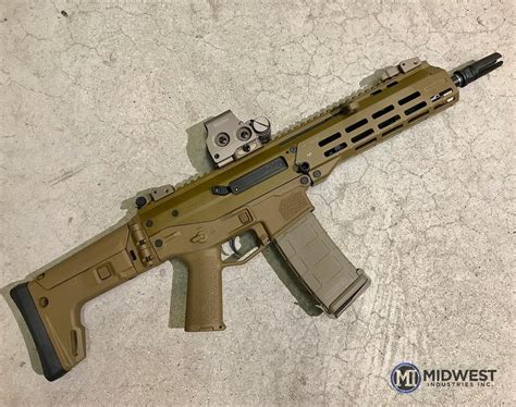 Bushmaster ACR SBR with our new coyote handguard. #midwestindustries # ...