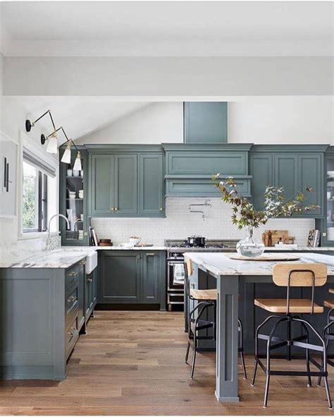 Pin by Austen Suchan on Kitchen | Green kitchen cabinets, Kitchen color trends, Modern kitchen