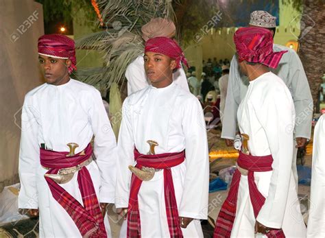 Three Young Omani Men In Traditional Dress, With Khanjars (Arabian ... | Traditional dresses ...