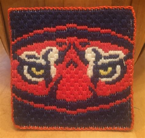 Auburn Tiger Eyes on 14 count canvas. | Needlepoint, Auburn tigers ...