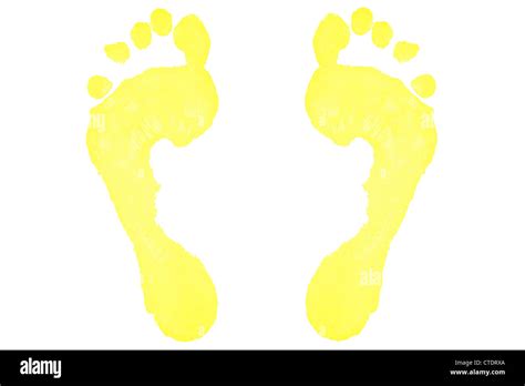 Two yellow footprints Stock Photo - Alamy