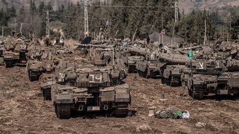 Tanks gather near Israeli-Lebanon border - as defence minister holds ...