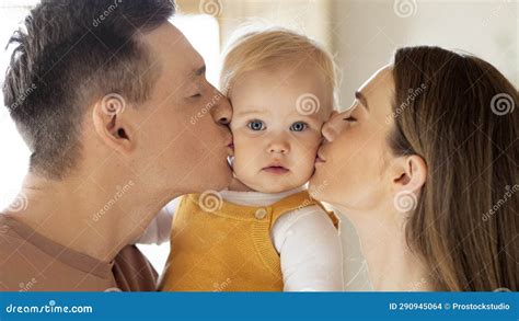 Closeup Portrait of Loving Parents Kissing Their Cute Little Baby at Home Stock Photo - Image of ...