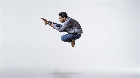 Man Jumping High While Posing · Free Stock Photo