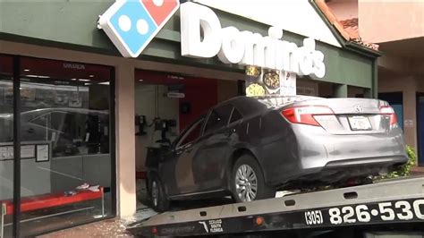 Pizza delivery driver crashes car into Domino's in Hialeah