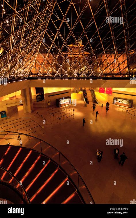 Louvre museum inside pyramid hi-res stock photography and images - Alamy