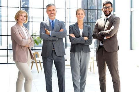 Premium Photo | Group of businesspeople standing together in office