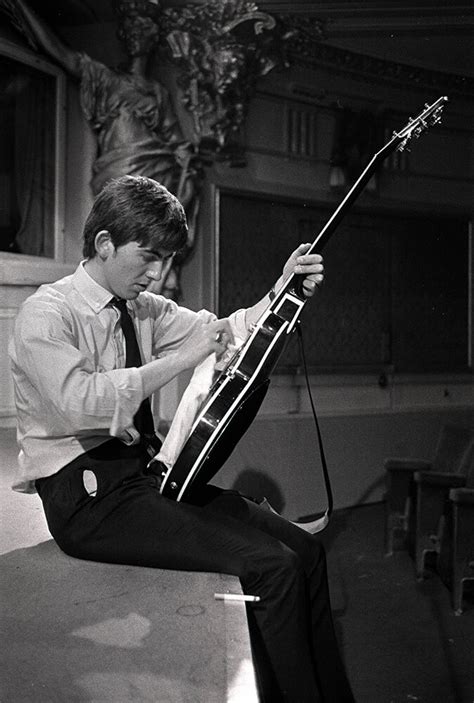 George Harrison Cleaning Guitar | Getty Images Gallery