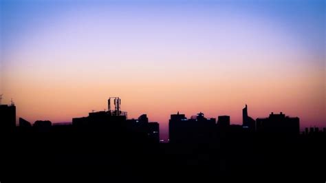 Premium Photo | Silhouette of city at sunset