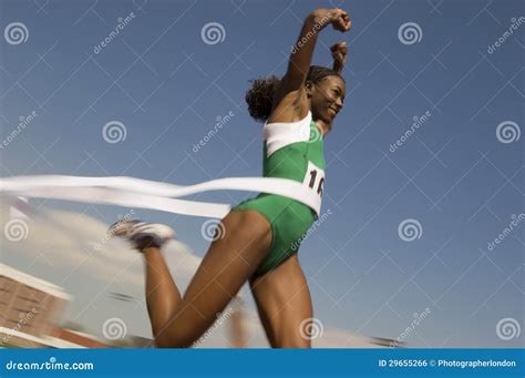 Female Runner Winning Race stock photo. Image of american - 29655266