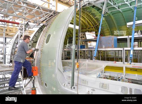 Airplane construction in a hangar Stock Photo - Alamy