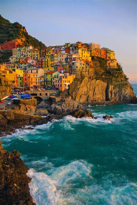 View of Manarola at sunset stock image. Image of exterior - 106555371