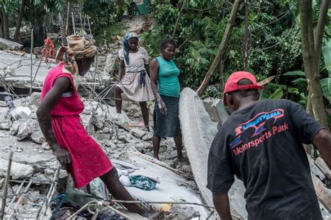 Amid rising frustrations, Haitian quake victims swarm relief trucks for ...