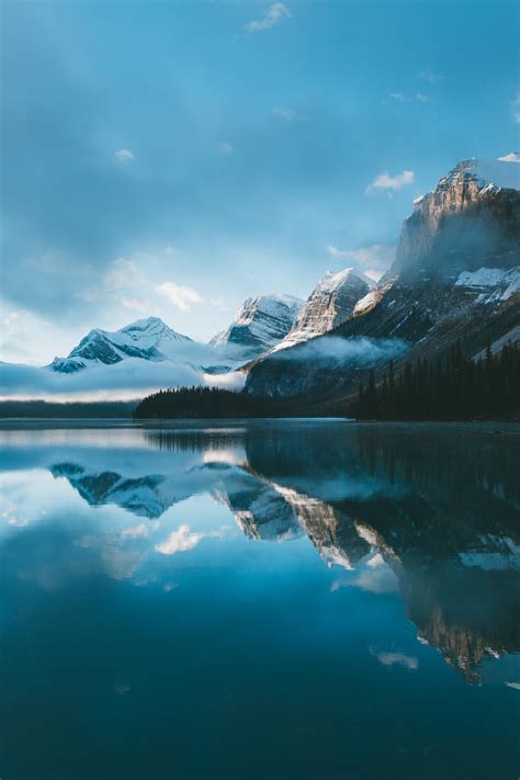 Maligne Lake at Sunrise, Canada [3749 × 5624] [OC] : r/EarthPorn