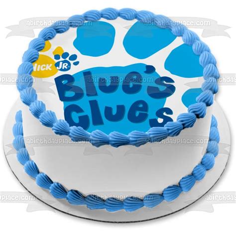 a birthday cake with blue frosting and paw prints on the top that says ...