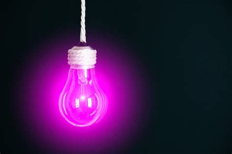 Premium Photo | Lamp bulb hanging on the rope. new idea concept.
