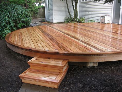 Curved cedar deck. Easy to build and great accent to backyard. Built by Gunderson Construction ...