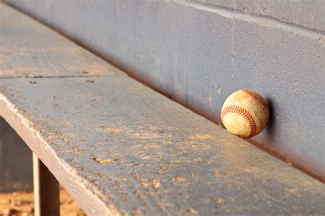 Old Baseball On Dugout Bench Stock Photo - Download Image Now - iStock