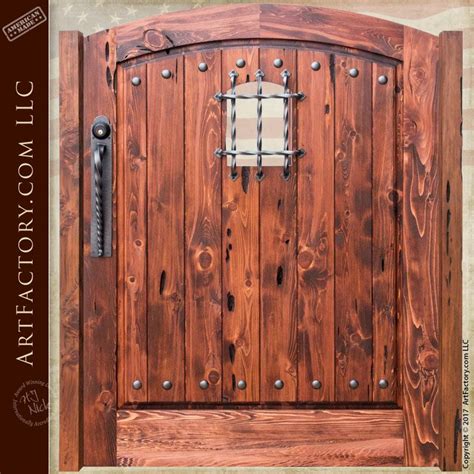 a wooden door with iron bars on it