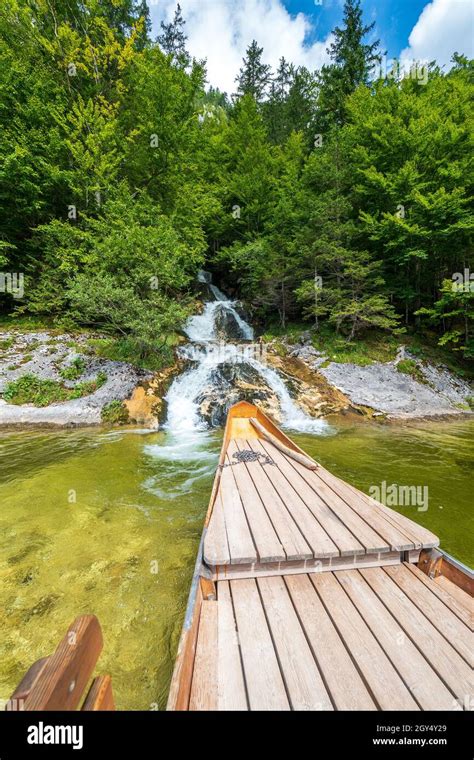 Waterfall (Traun-Ursprung) splashing into the legendary Lake Toplitz ...