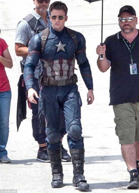 Chris Evans slips Captain America suit back on to film action scenes ...