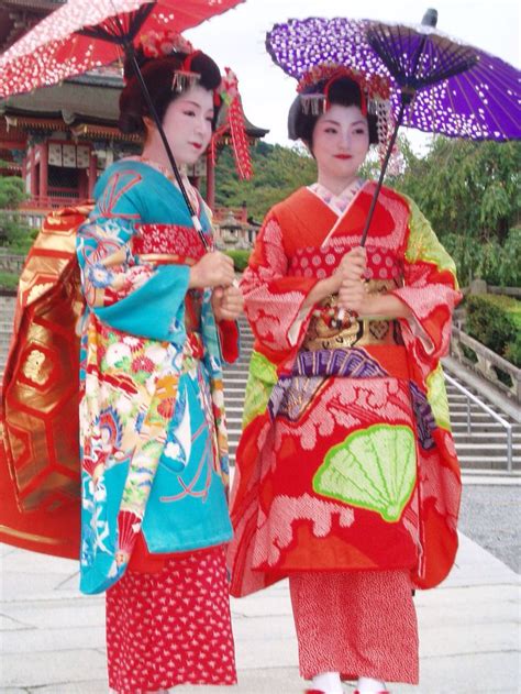 Geisha girls holding umbrellas | Japanese culture, Geisha girl, Japan culture